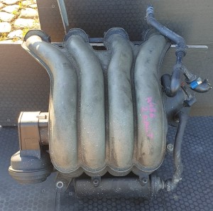 KOLEKTOR SSĄCY 06B133210AJ AUDI VW 2.0 ALT