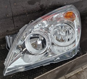 LAMPA LEWA OPEL ASTRA H LIFT