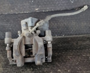 ZACISK HAMULCOWY LEWY TYŁ 3Q0615405J TYŁ VW PASSAT B8 KOMBI