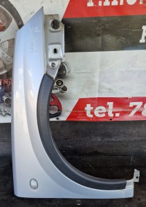 BŁOTNIK PRAWY PRZÓD OPEL CORSA C Z157