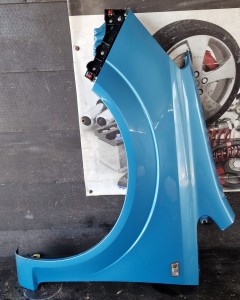 BŁOTNIK LEWY PRZÓD OPEL ZAFIRA B Z20N