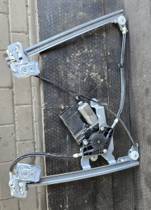 PODNOŚNIK MECHANIZM SZYBY LEWY PRZÓD 1U1837401E 101446203 SKODA OCTAVIA I