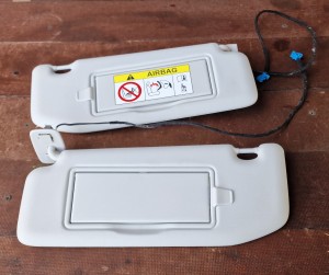 Osłona przeciwsłoneczna prawa lewa komplet 98173687 Opel Astra L VI