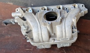 Kolektor ssący 24405386 Opel Astra H